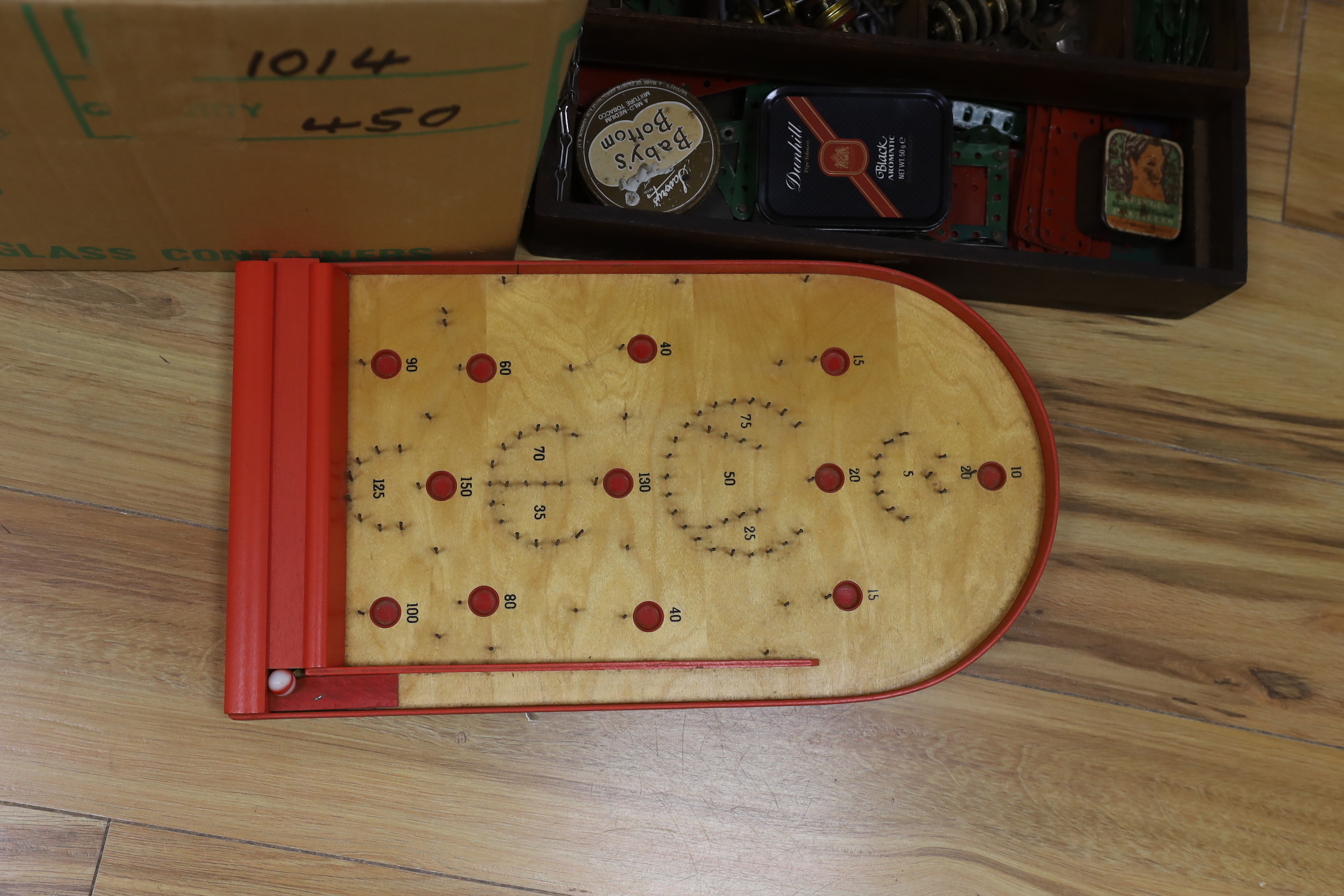 A quantity of Meccano, Dinky toys and a bagatelle board
